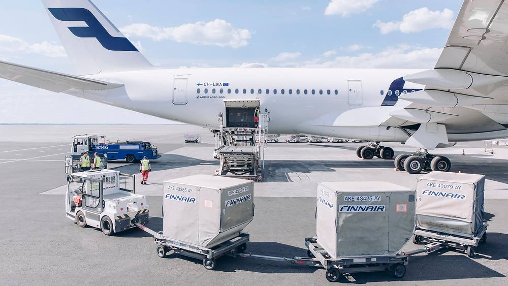 A330 being loaded with Cargo containers