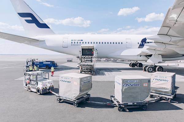 A330 being loaded with Cargo containers